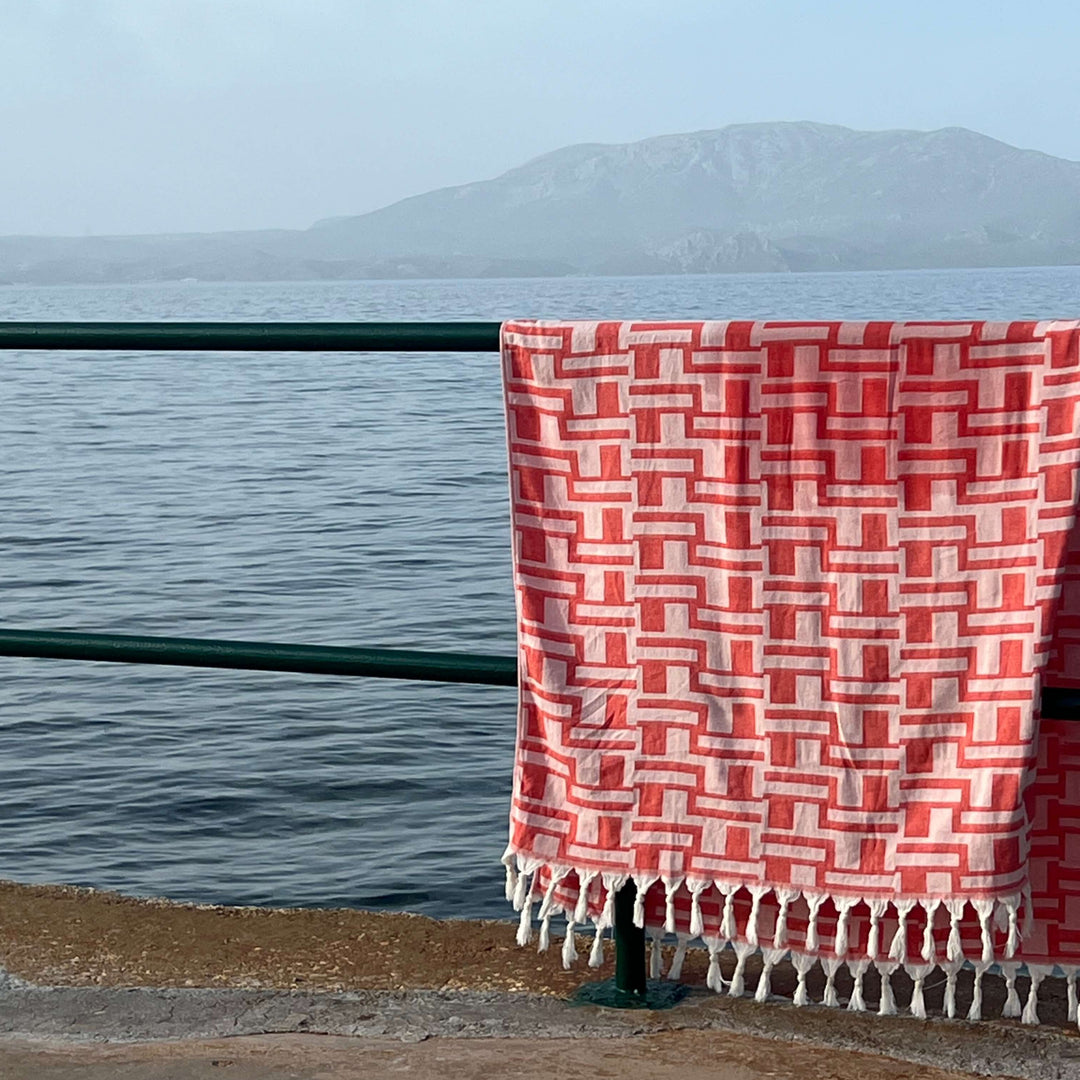 Catania Peshtemal in Coral, Lightweight and Quick-Drying Turkish Peshtemal Beach Towels. Versatile and Eco-Friendly.