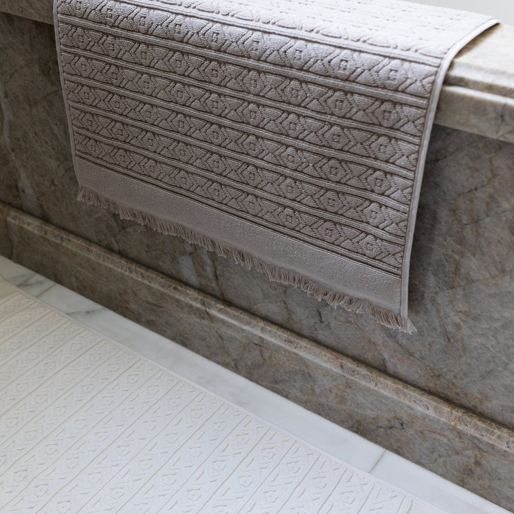 Fringed Ikat Bath Mat, Lightweight and Absorbent Turkish Cotton Towels. Luxuriously Soft and Eco-Friendly.