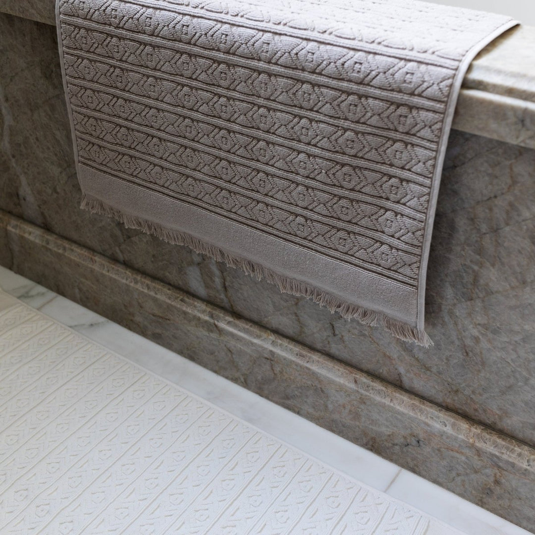 Fringed Ikat Bath Mat, Lightweight and Absorbent Turkish Cotton Towels. Luxuriously Soft and Eco-Friendly.