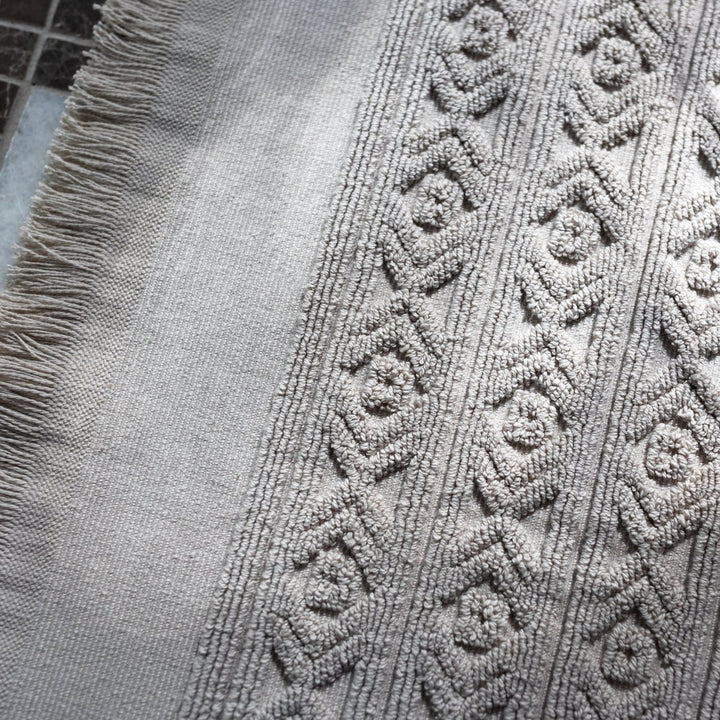 Fringed Ikat Bath Mat, Lightweight and Absorbent Turkish Cotton Towels. Luxuriously Soft and Eco-Friendly.