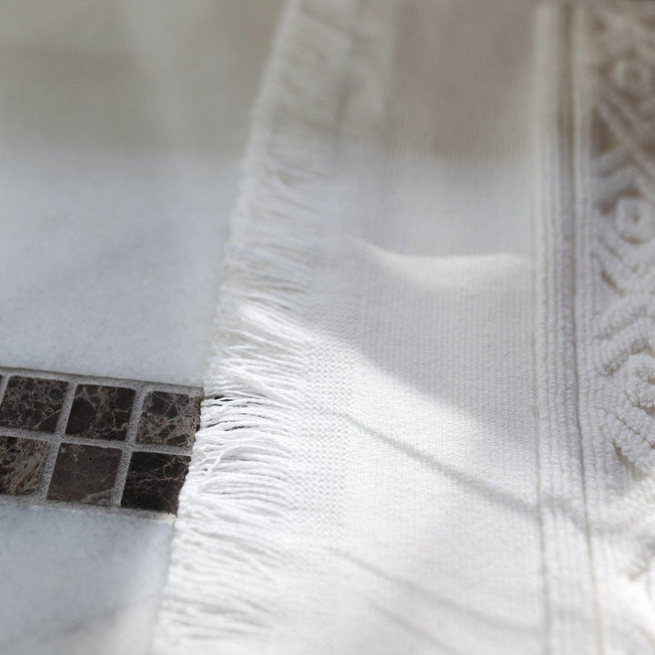 Fringed Ikat Bath Mat, Lightweight and Absorbent Turkish Cotton Towels. Luxuriously Soft and Eco-Friendly.