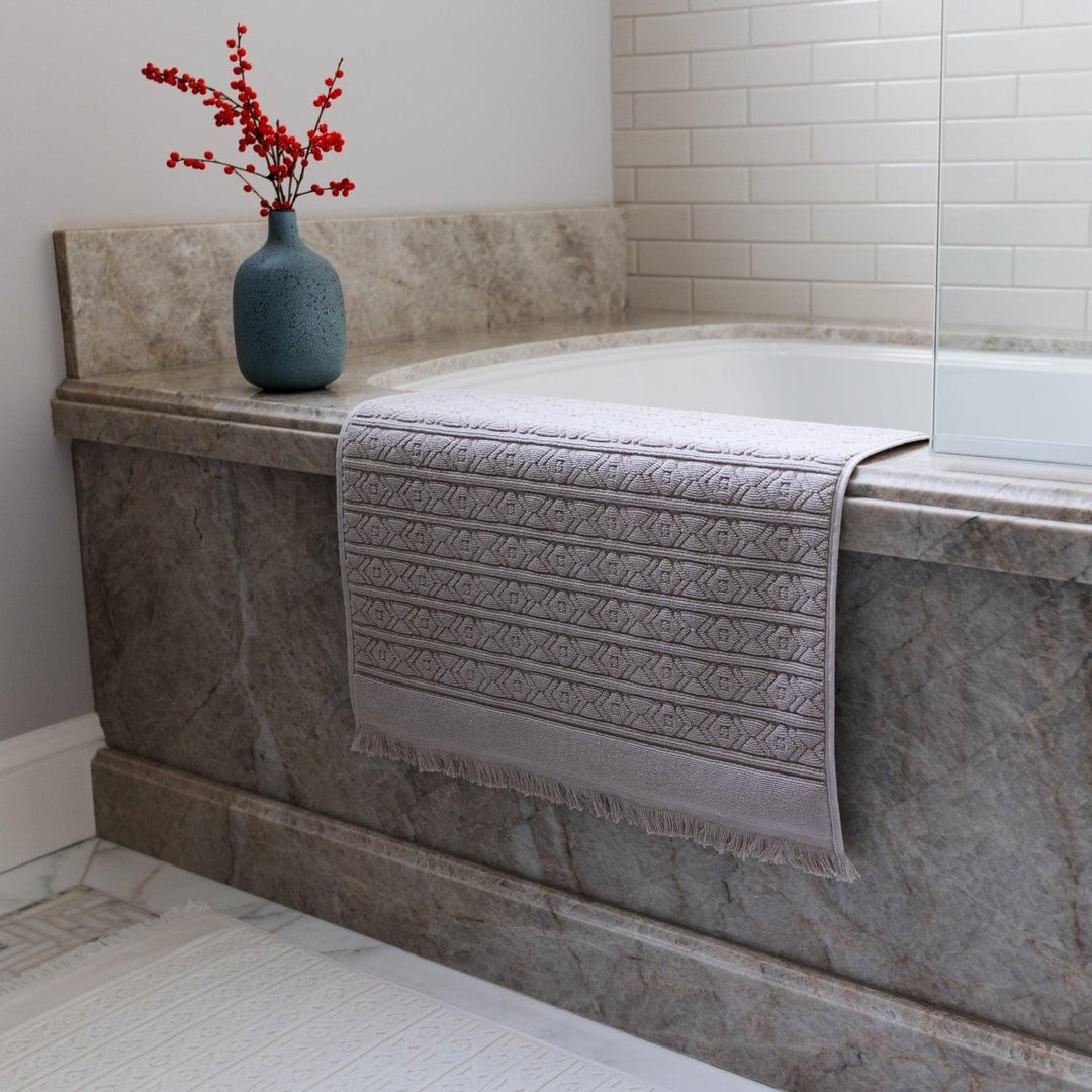 Fringed Ikat Bath Mat, Lightweight and Absorbent Turkish Cotton Towels. Luxuriously Soft and Eco-Friendly.