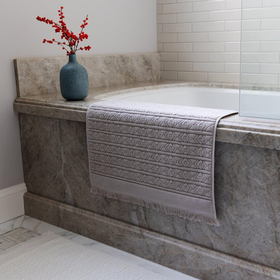 Fringed Ikat Bath Mat, Lightweight and Absorbent Turkish Cotton Towels. Luxuriously Soft and Eco-Friendly.