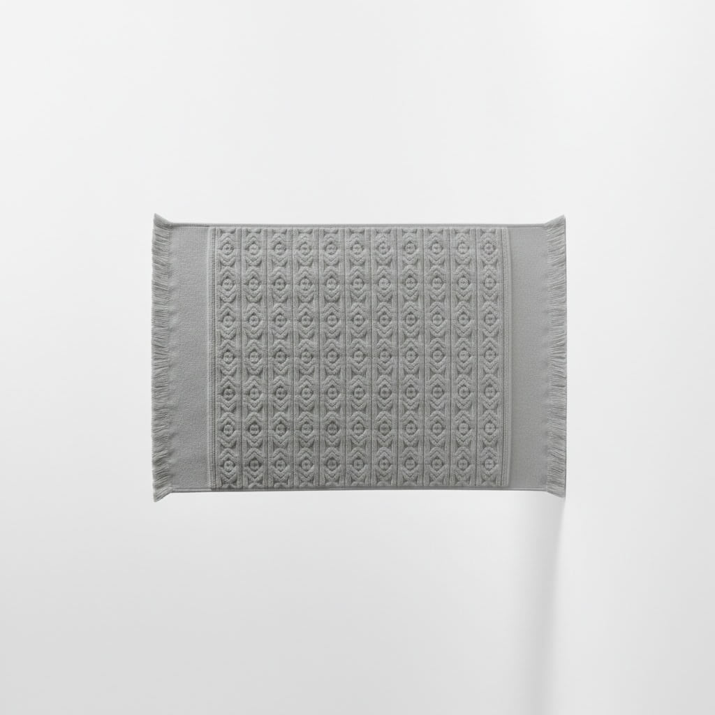 Gray bath mat on a white background